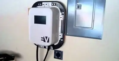 Electric car charger installation with wall-mounted EV charging station in Louisville, KY