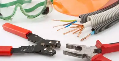 Electrical wiring repair with professional tools and safety equipment in Jeffersonville, IN
