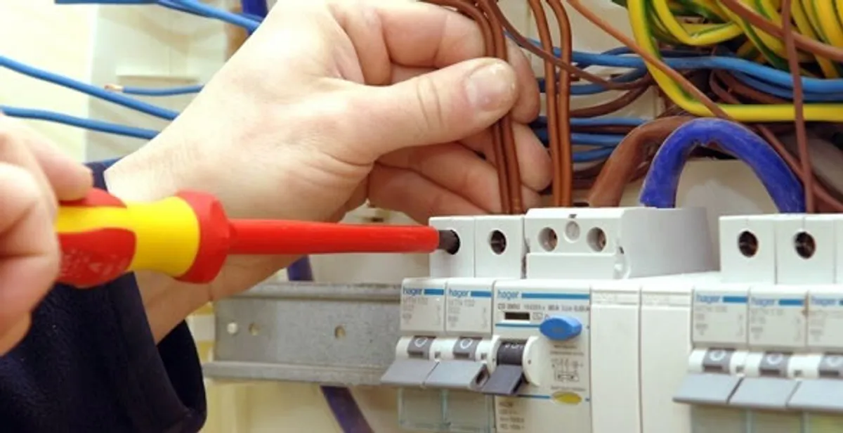 electrician services performing professional electrical panel wiring and connections in Louisville, KY