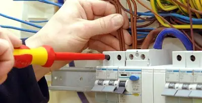 electrician services performing professional electrical panel wiring and connections in Louisville, KY