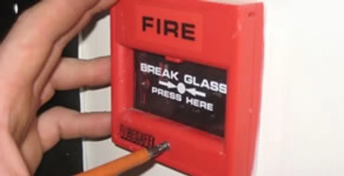 fire alarm installation service showing manual fire alarm pull station installed by licensed electricians in Louisville, KY