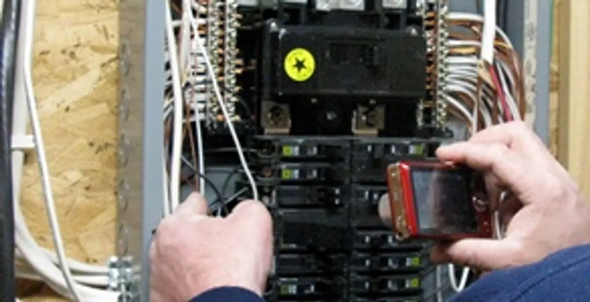 Home electrical inspection of circuit breaker panel by licensed electrician in Louisville, KY