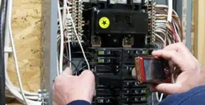 Home electrical inspection of circuit breaker panel by licensed electrician in Louisville, KY