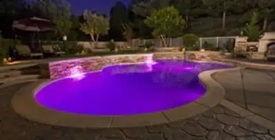 pool light installation and repair services illuminating a residential swimming pool in Louisville, KY