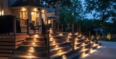 Residential electrician installing outdoor lighting for home safety in Louisville, KY