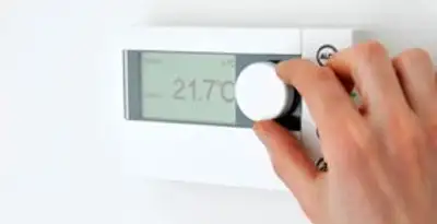 Thermostat installation service with professional adjusting temperature control in Louisville, KY